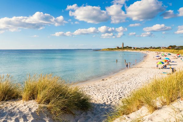 White sandy beach with turquoise water on the Danish Baltic Sea coast